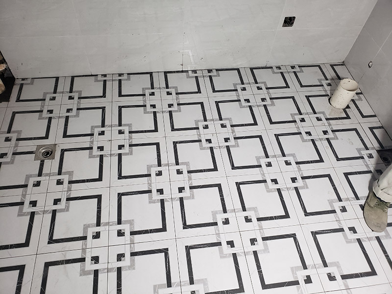 廚衛(wèi)地磚鋪貼：干鋪法是將沙子和水泥按照3：1的比例混合后兌少量的水，使水泥和沙子混合到可以用手攥成團(tuán)的黏稠度。將混合好的沙子水泥鋪在地面上，用一個(gè)平板把表面摸平。在瓷磚背面抹上黏稠度非常高的水泥，把瓷磚放到地面上，用橡皮錘敲實(shí)就完成了,主要用于地面瓷磚的鋪裝。